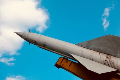 Low angle view of rocket against sky