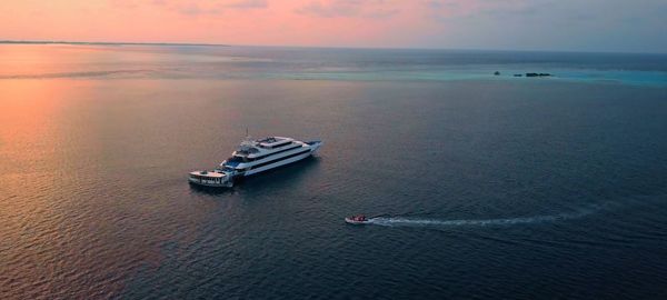 High angle view of sea against sky during sunset