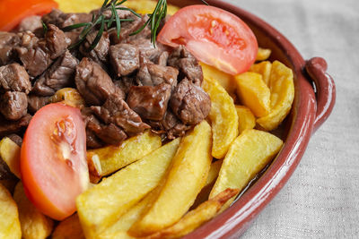 Close-up of burger in bowl on table