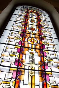 Low angle view of stained glass window