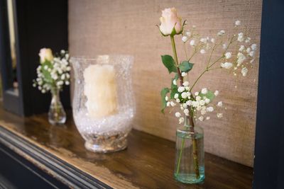 Flower vase on glass table