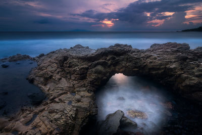 Scenic view of sea against dramatic sky