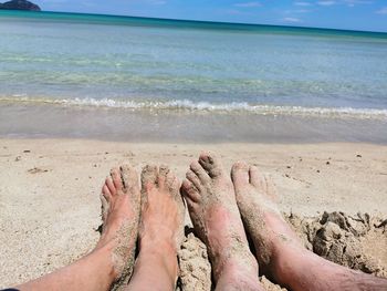 Low section of people on beach