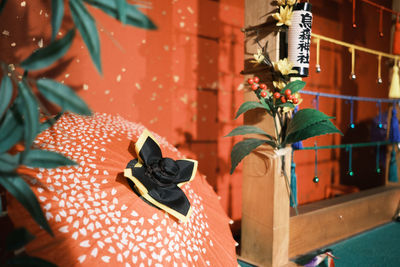 Close-up of red shoes hanging for sale