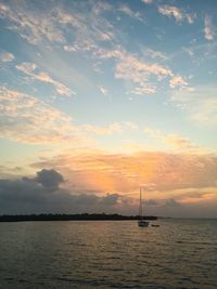 Scenic view of calm sea at sunset