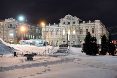 View of illuminated city at night