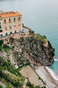 High angle view of rock formations in sea