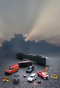 High angle view of toy car against sky during sunset