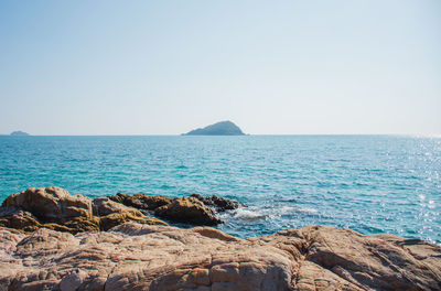 Scenic view of sea against clear sky