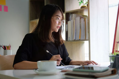 Businesswoman working at office