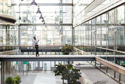 Man walking in modern building