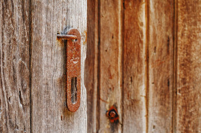 Close-up of rusty door knocker