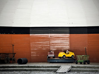 Car ride and push carts by wall