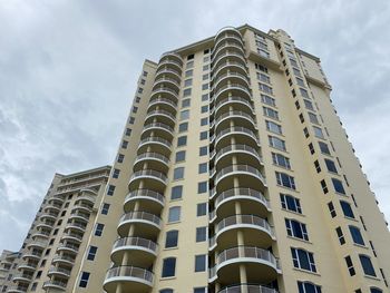 Low angle view of modern building against sky