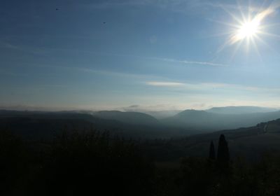 Scenic view of silhouette mountains against sky