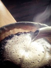 Close-up of hand holding water