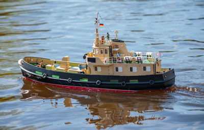 Remote controlled ship model is remote controlled on a lake