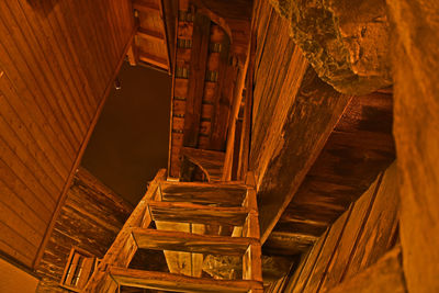 Low angle view of illuminated ceiling