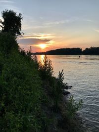 Scenic view of sea against sky during sunset