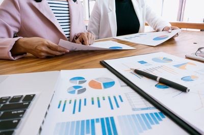 Low angle view of man working on table