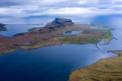 Aerial view of snaefellsnes penisula and atlantic ocean near kirkjufell mountain, iceland by drone
