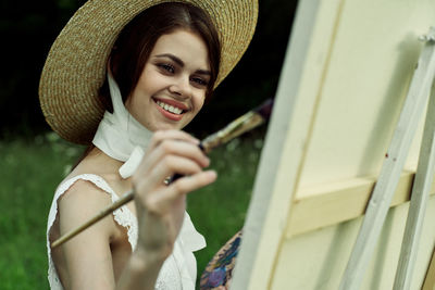 Portrait of young woman looking away