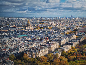 Sightseeing aerial view over the paris city, france. les invalides building with golden dome