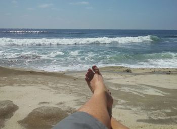 Scenic view of beach against sky