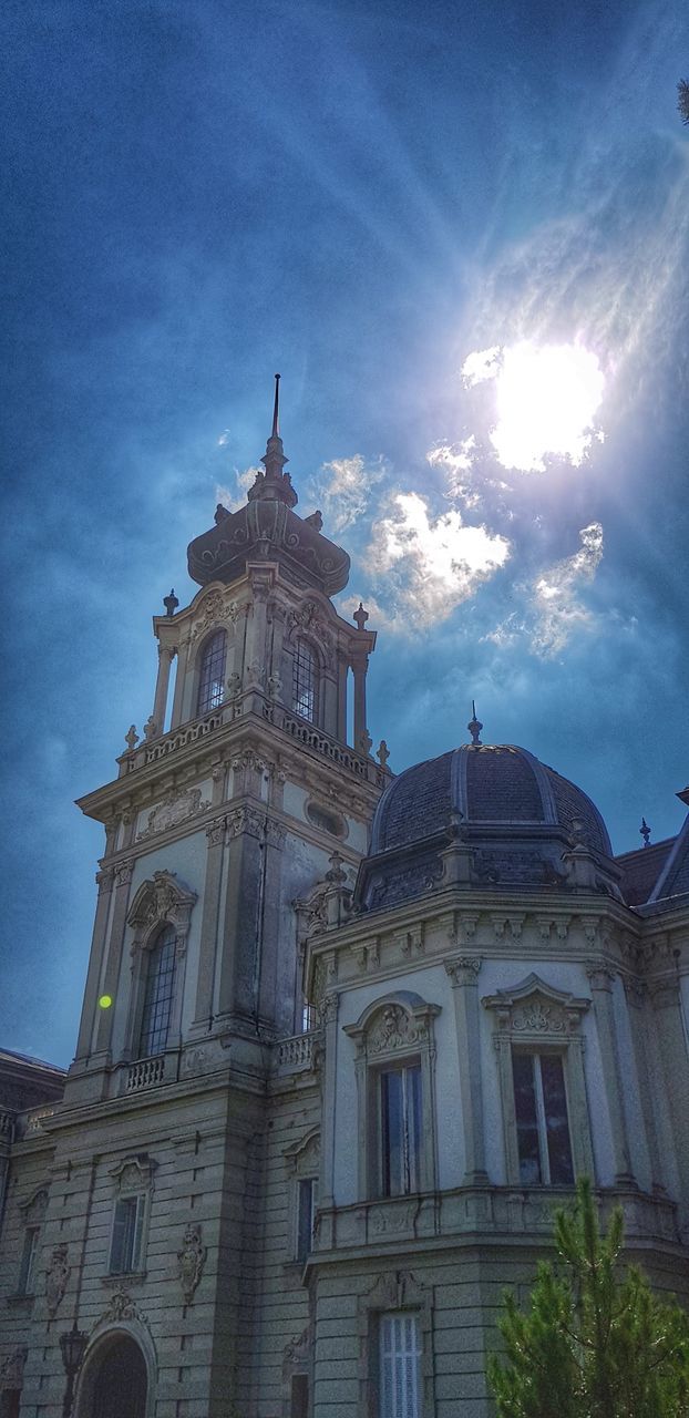 architecture, sky, built structure, building exterior, low angle view, belief, place of worship, building, religion, nature, cloud - sky, spirituality, no people, sunlight, sunbeam, travel destinations, day, sun, lens flare, bright, spire, ornate