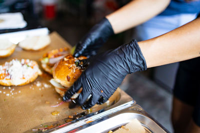 Midsection of man preparing food