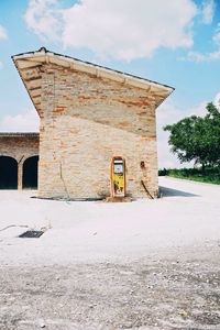 Built structure against clouds