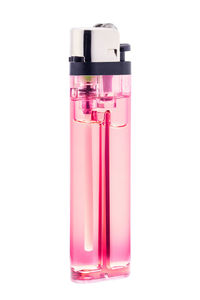 Close-up of pink bottle against white background