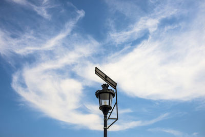 Low angle view of street light against sky