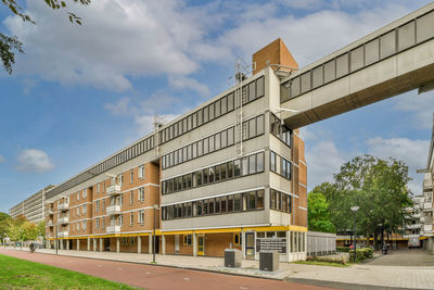 Buildings in city against sky