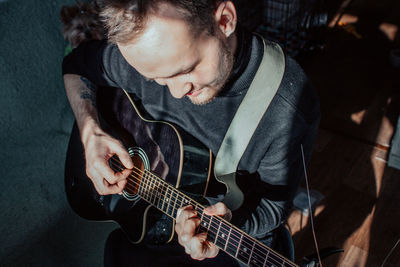 Young man playing guitar