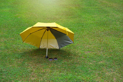 Umbrella on field during rainy season