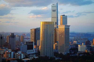 Skyscrapers in city against sky