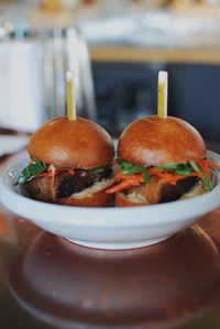 Close-up of burger in plate on table