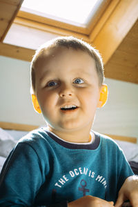 Portrait of cute boy looking away