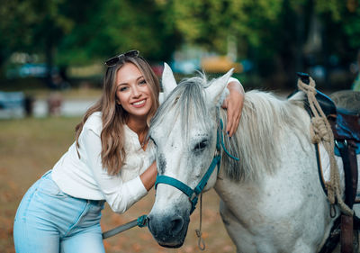 Young woman smiling outdoors