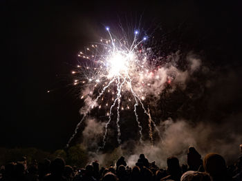 Firework display at night