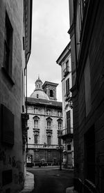 Buildings in city against sky