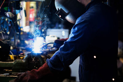 Man working on metal in industry