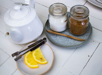 High angle view of fruits in jar on table