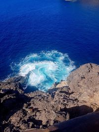 High angle view of beach against blue sky