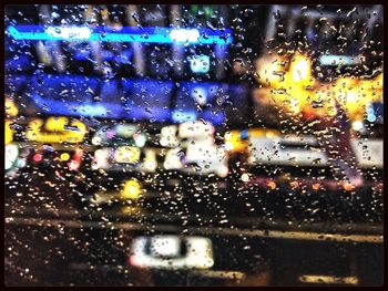 Close-up of rain drops on window