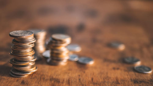 Close-up of coins on table