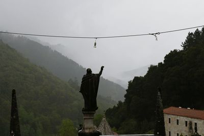 Statue against sky