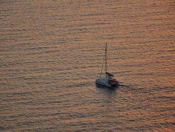 High angle view of sailboat sailing on sea