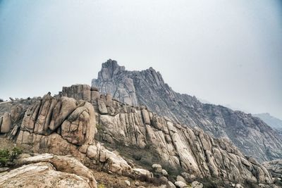 Low angle view of rocky mountains